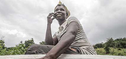 Smallholder farmer using mobile technology